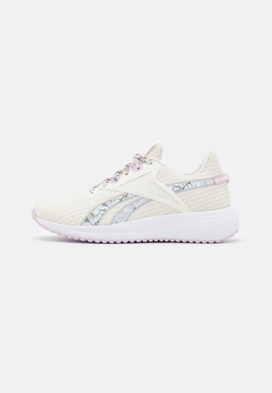 Light beige running shoe with floral-patterned side stripes, white cushioned sole, and lavender accents on laces and heel tab, side view.