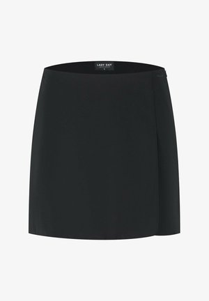 Zwarte rechte minirok met zijrits, gladde stof en "Lady Day Amsterdam" label aan de taille.
