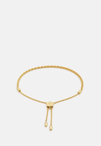 Gold twisted chain bracelet featuring an adjustable slider with two heart charms and a circular accent with engraved design.