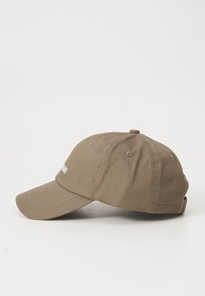 Khaki cotton baseball cap with a curved brim, six ventilation eyelets, and a strap closure at the back. Features embroidered branding on the front.
