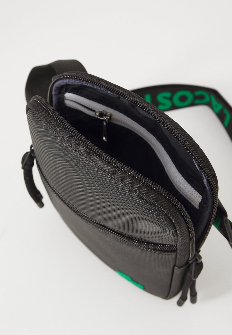 Lacoste FLAT Sac bandoulière noir ZALANDO