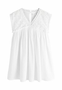 White sleeveless top made from lightweight fabric, featuring intricate lace accents on shoulders and a gathered, flowy body.