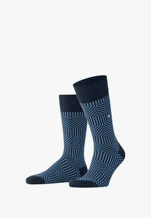 Marineblaue Socken mit einem geometrischen Muster in hellerem Blau, gerippten Bündchen und einer glatten Textur. Mit verstärkten Zehen- und Fersendetails.