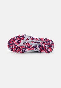 Shoe sole in white, purple, red, and pink colors; textured pattern with multicolored flecks; features a distinct design and grip pattern.