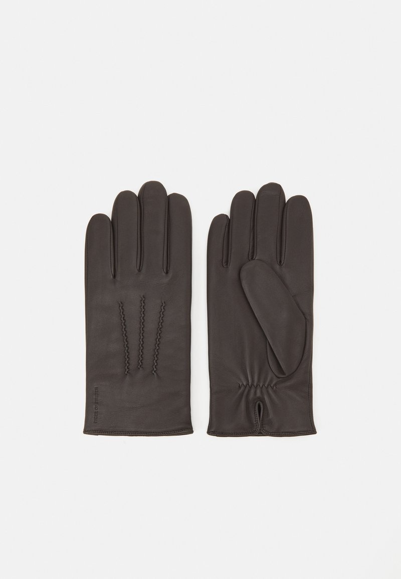 Bruna läderhandskar med tre vertikala sömdetaljer på baksidan, snug elastisk krage och slät finish. Avslappnad design med klassisk form.