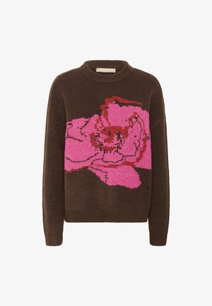 Brun stickad tröja med en stor rosa blommönster på framsidan. Rund halsringning, långa ärmar, mjuk textur och avslappnad passform.