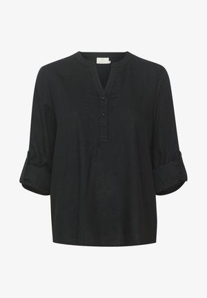 Blouse noire à col, avec des manches trois-quarts, présentant une patte de boutonnage, une coupe ample et des poignets retroussés pour une longueur ajustable.