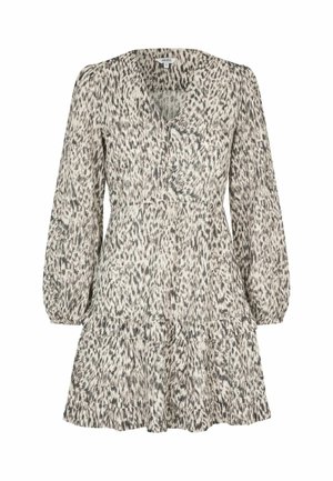 Melnā un baltā dzīvnieku raksta kleita ar garām pūkainām piedurknēm, V-veida izgriezumu un kārtainu volānu apakšu. Izgatavota no viegla auduma.