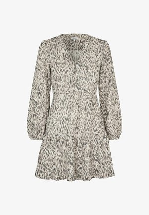 Vestido con estampado animal en blanco y negro, con mangas largas abullonadas, escote en V y dobladillo con volantes a capas. Confeccionado con tela ligera.