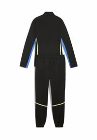 Zwarte trainingspak met lange mouwen en broek. Heeft blauwe zijpanelen en fluorescerende groene accenten. Gladde, rekbare stof, elastische taille.