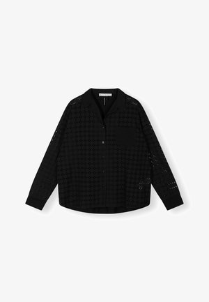Black button-up shirt with a perforated pattern, long sleeves, a collared neckline, and a chest pocket. Textured fabric with a relaxed fit.