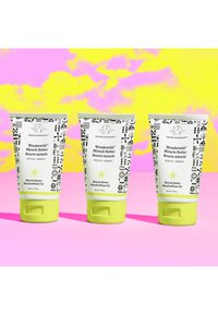 Three tubes of Drunk Elephant Wonderwild Miracle Butter. Each has a white background with black patterns and a yellow cap. 60 ml size.