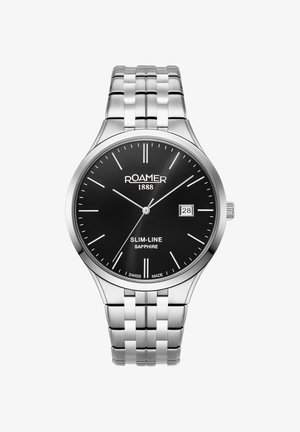 Rustfrit stål armbåndsur med sort urskive, sølv timemarkører, datovisning og et fleksibelt metalarmbånd. Har et safirglas.