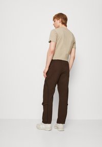 Night Addict ANONB - Stoffhose - chocolate brown