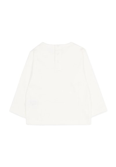 Camicia a maniche lunghe di colore crema realizzata in tessuto morbido, con scollatura rotonda e tre bottoni a pressione sul retro.