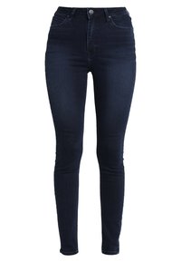 Jeans skinny de tiro alto en denim oscuro. Presenta un diseño clásico de cinco bolsillos y un botón metálico en la cintura. Textura suave en todo el tejido.