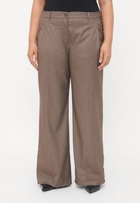 Brown wide-leg trousers made from textured fabric, featuring a button closure and front pleats for added detail. Tailored fit.