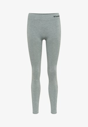 Grå leggings lavet af blødt, strækbart materiale med en tætsiddende pasform. Har en flad talje og et lille logo øverst.