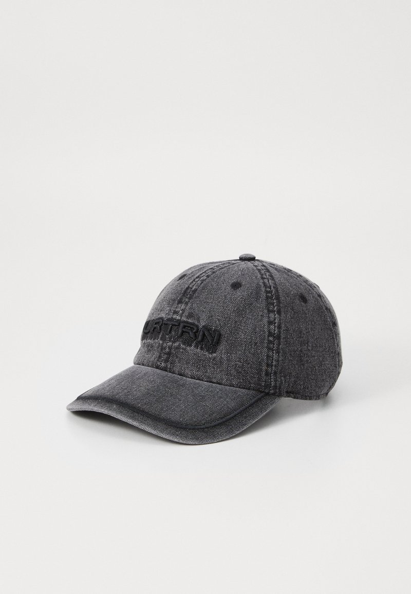 Gray denim baseball cap with a curved brim, featuring an embroidered logo on the front. It has a textured fabric and six ventilation eyelets.