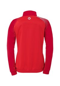 Rød jakke med høj krave, lange ærmer og et geometrisk mønster på den øverste ryg. Lavet af glat stof med en tætsiddende pasform.