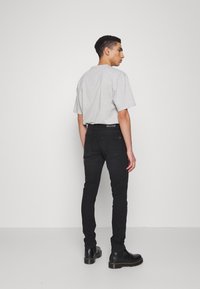 Denim Project TOM - Calças de ganga justas - black washed