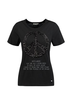 T-shirt noir à manches courtes avec un grand symbole de paix scintillant et un texte en dessous affichant une citation romantique de Key Largo.