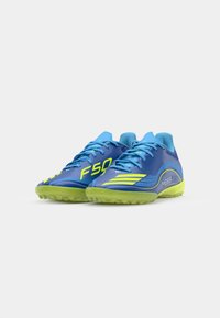 Blue and lime green soccer shoes with a textured upper, prominent F50 branding, and traction outsole, featuring laces and padded tongue.