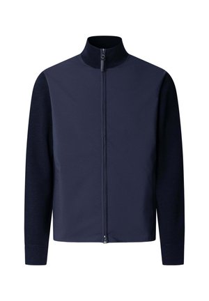 Chaqueta con cremallera azul marino, con cuello alto, mangas largas y un panel frontal liso que contrasta con las mangas y la parte trasera de punto.