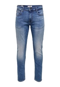 Μπλε στενές τζιν με ελαφρύ ξεβάφτισμα στους μηρούς, σχεδιασμός με πέντε τσέπες, κλείσιμο με κουμπί και φερμουάρ, και θηλιές για ζώνη.