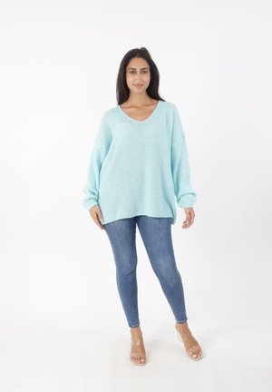 - Sweter