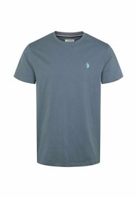 Krátký rukáv, tyrkysové tričko z bavlny. Kolo výstřih s jemnou logem vyšitým na hrudi. Hladká textura, volný střih.