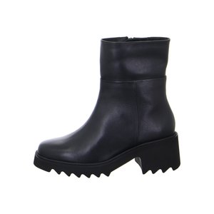 Black leather ankle boot with chunky, jagged sole and mid-height block heel, featuring smooth upper and side zipper closure.