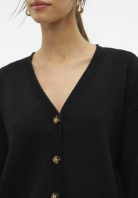Vero Moda ROLL V-NECK - Adīta jaka - black