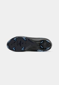 Black athletic shoe sole featuring a textured surface, striking blue accents, and a multi-directional traction pattern.