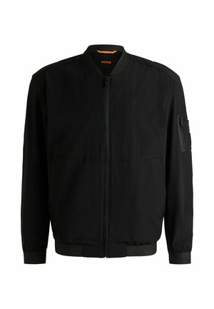 Black bomber jacket made from smooth fabric, featuring a front zipper, two front pockets, ribbed cuffs, and a patch pocket on the sleeve.