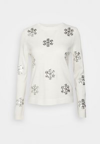 Maglione bianco con maniche lunghe e collo rotondo, decorato con motivi a fiocco di neve neri e argentati in tutto il capo. Texture lavorata a maglia.