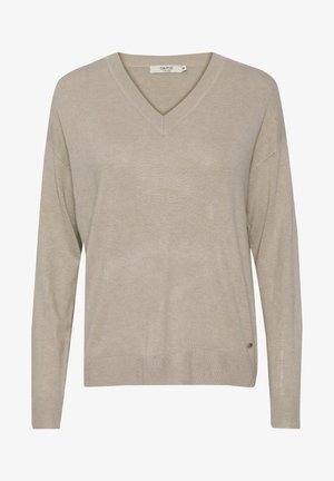 V-hals genser i lys beige, laget av myk strikket stoff. Har lange ermer, en avslappet passform, og en liten logo aksent på siden.