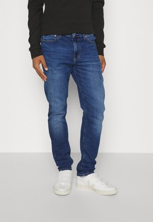 Calvin Klein Jeans SLIM TAPER - Traperice uskog kroja - denim dark
