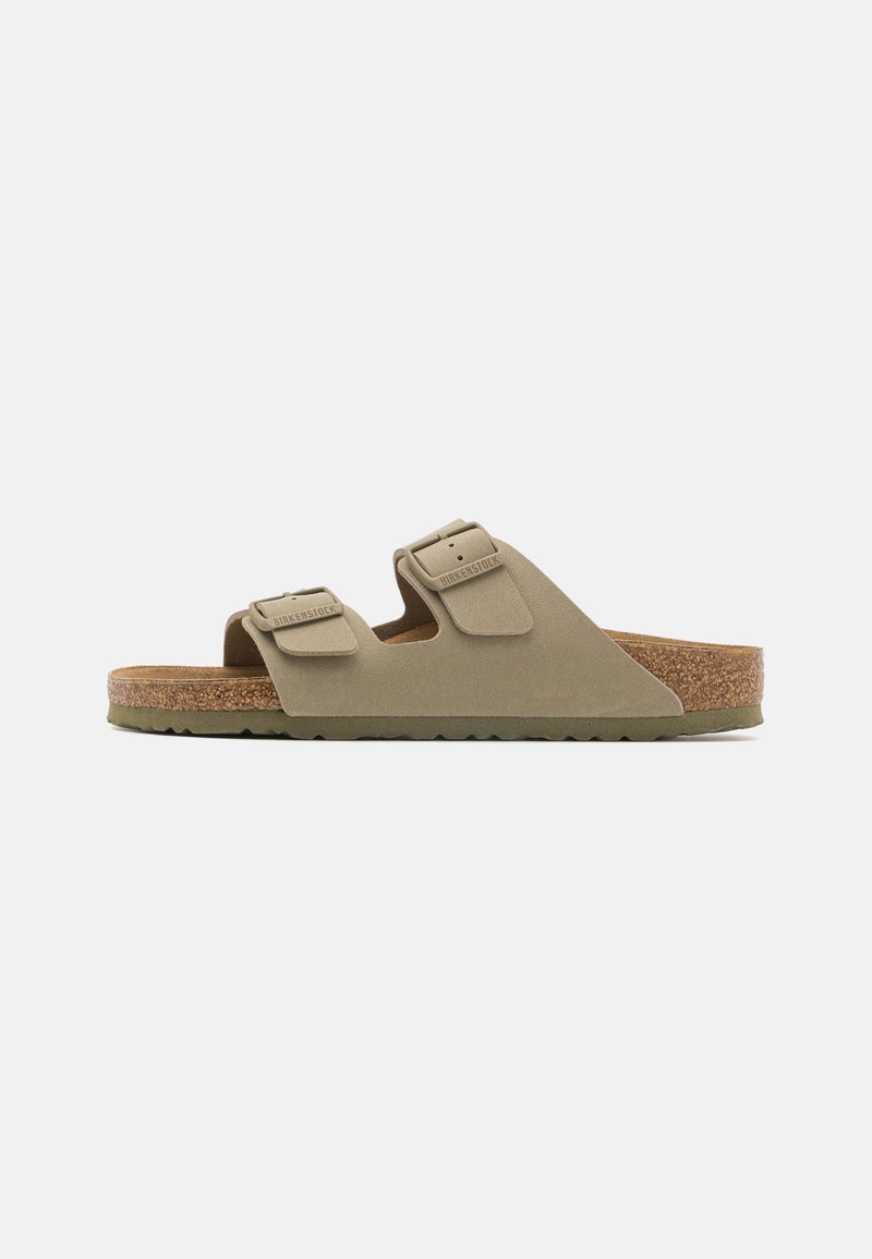 Olive green, two-strap slide sandal with a cork footbed and rubber sole. Features adjustable buckles and a smooth texture.