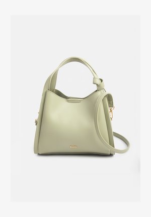 Sac à main en cuir vert clair avec poignée courte et bandoulière longue amovible, avec petit logo doré "RAID" à l'avant.