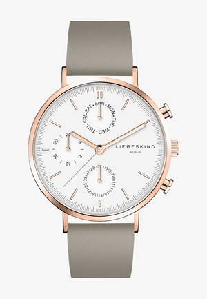 Rund hvid urskive med rose-guld detaljer, grå læderrem, chronograph subskiver og dag-dato indikatorer.