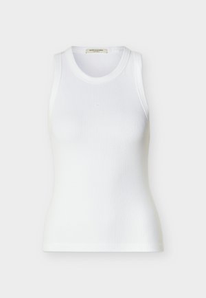 Witte geribbelde mouwloze tanktop met ronde halslijn, slanke pasvorm en Scotch & Soda merklabel binnenin de kraag.