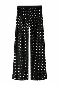 Crne široke hlače s bijelim točkicama, s elastičnim pojasom, izrađene od teksturiranog tkanja za udobnost.