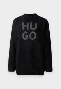 Must mustri kootud sviiter ribatud tekstuuriga, ümar kaelus ja hõbedane "HUGO" logo ees. Üks suurus üle suuruse, pikad varrukad.