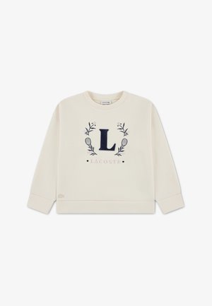 Crèmekleurige sweatshirt met een marineblauw "L"-logo en bloemmotieven, voorzien van geribbelde manchetten en zoom. Plat weergegeven op een witte achtergrond.