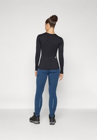 Norrøna FEMUND WARMWOOL FLEX - Tights - indigo night