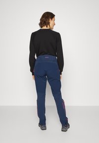 Norrøna FALKETIND HEAVY DUTY PANTS - Calças para exterior - indigo night/honeysuckle