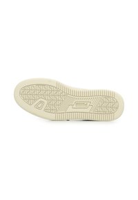 Suola di sneaker beige con un motivo a trama testurizzata e logo Puma impresso al centro su uno sfondo bianco.