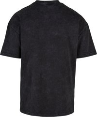Black oversized t-shirt made of cotton blend, featuring a textured finish, crew neckline, and short sleeves. No visible logos or patterns.