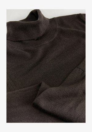 Brown turtleneck sweater with a soft, knitted texture. Features a high neck and overlapping panels in the body for a layered design.